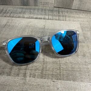 Oakley Ojector Clear Frame Sunglasses with Blue Mirrored prism Lenses